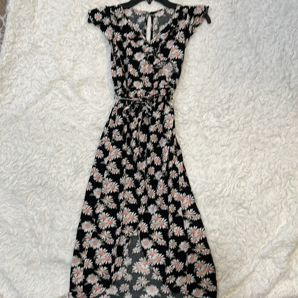 Girls romper, skort. Sz large. Excellent condition. Black with flowers.